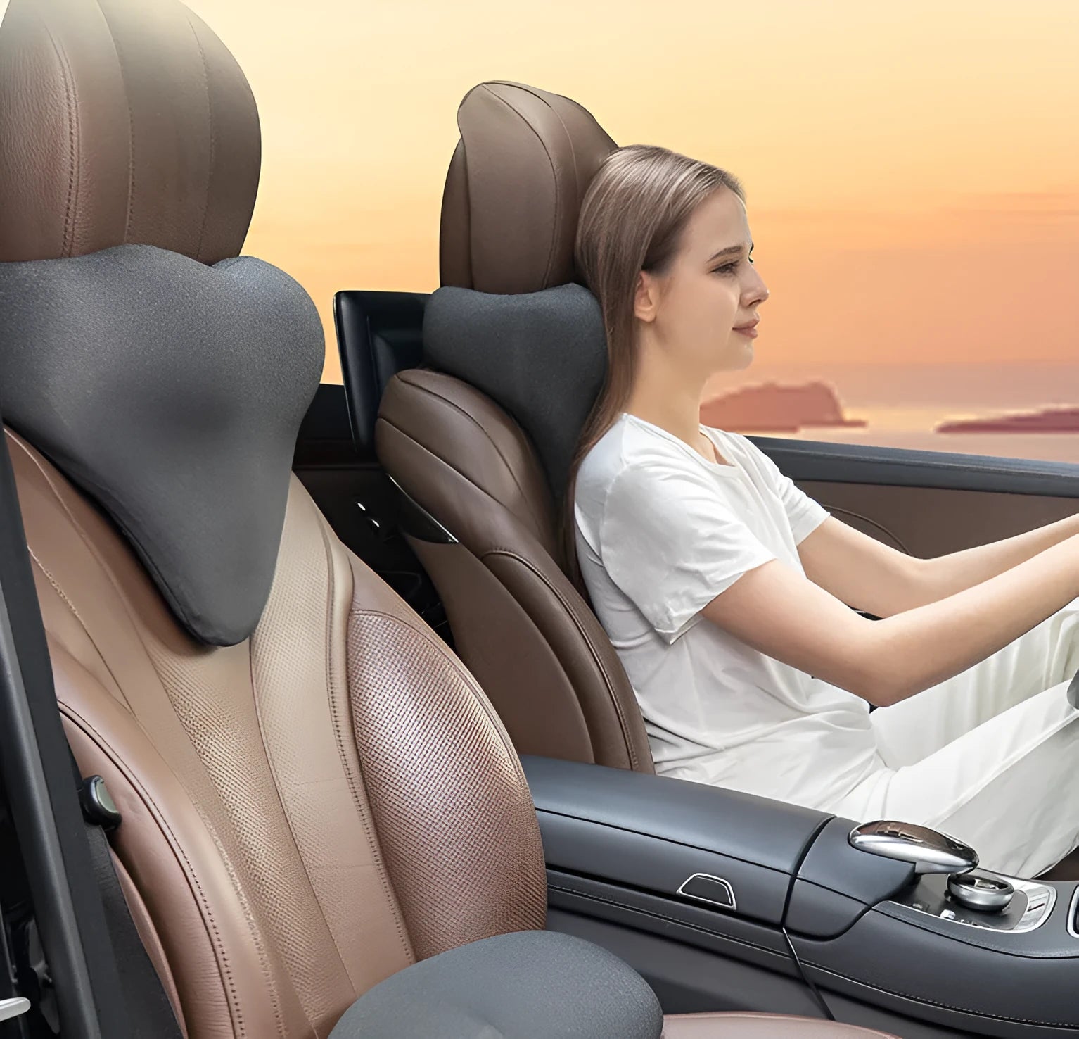 Dark gray universal car neck memory foam pillow on a car seat headrest.