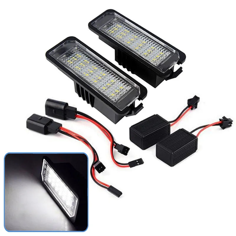 Two white LED licence plate light bulbs for Volkswagen Golf, Polo, and Phaeton models.