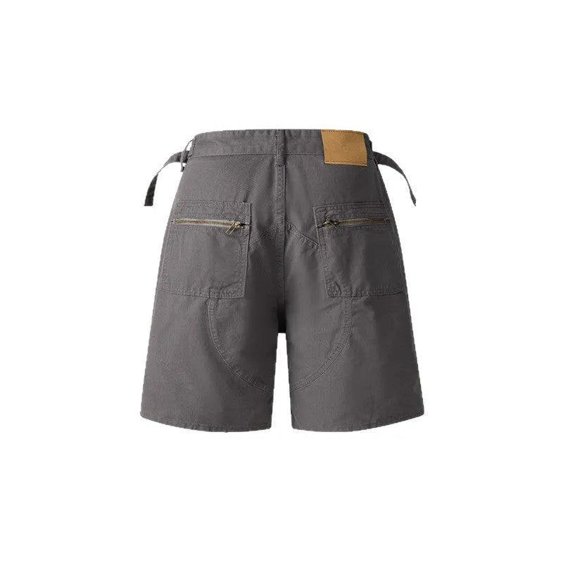 Retro loose-fit workwear shorts in washed cotton cloth, shown in gray colour