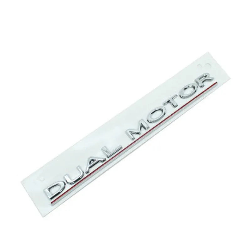 Tesla Model 3 black and red ABS plastic bumper sticker measuring 19x3cm with double motor text