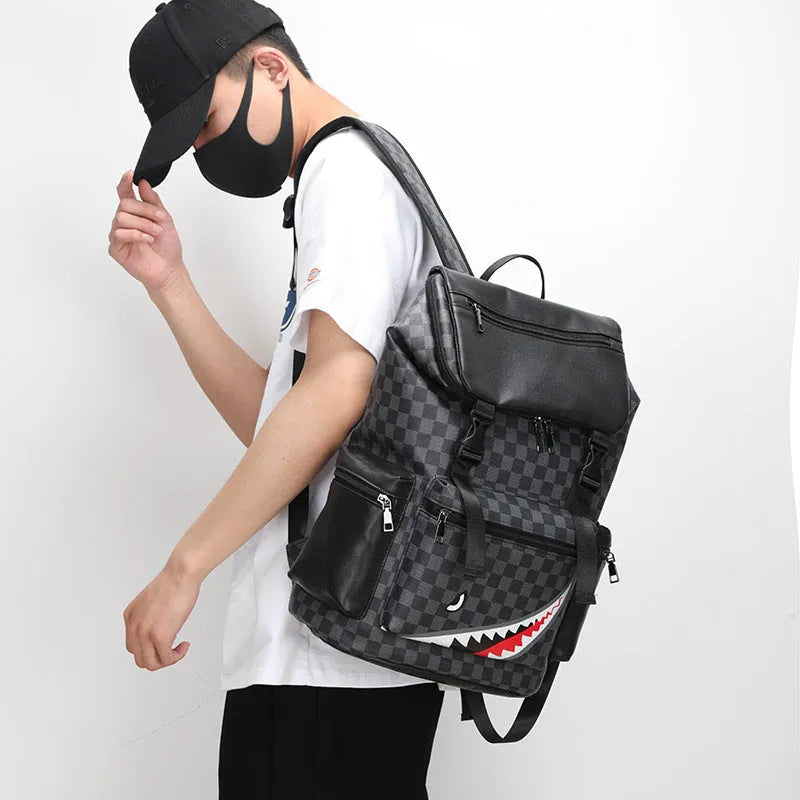 Black checkered print PU leather large capacity backpack with curved shoulder straps.