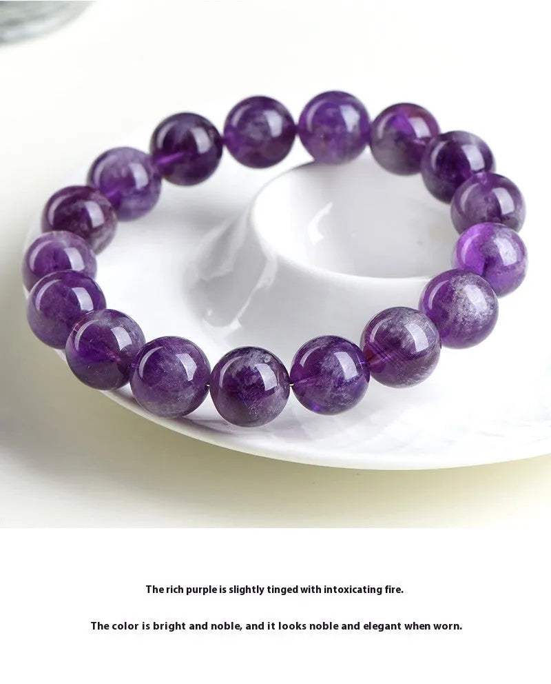 Natural feather amethyst bracelet in Snow Mountain Purple with scattered beads and Ruyi symbol