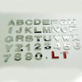 Zinc alloy 3D raised letter car sticker for bumper customisation in black or silver.