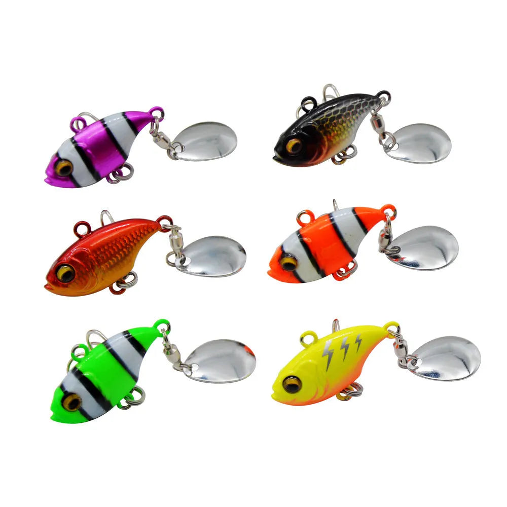 Metal sea fishing lure with rotating sequin in multiple colour options including zebra patterns