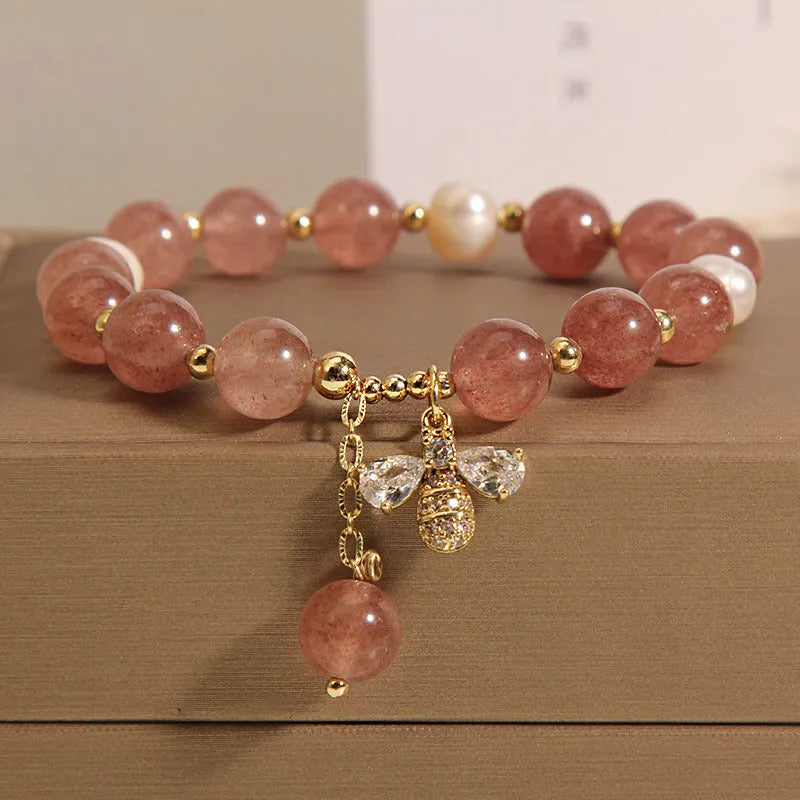 Women's strawberry quartz and freshwater pearl bracelet with zircon details in alloy setting