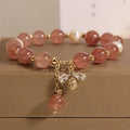 Women's strawberry quartz and freshwater pearl bracelet with zircon details in alloy setting