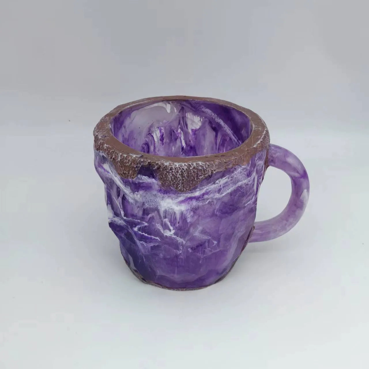 Purple resin mineral crystal coffee mug with handle showing 3D texture and 10cm height