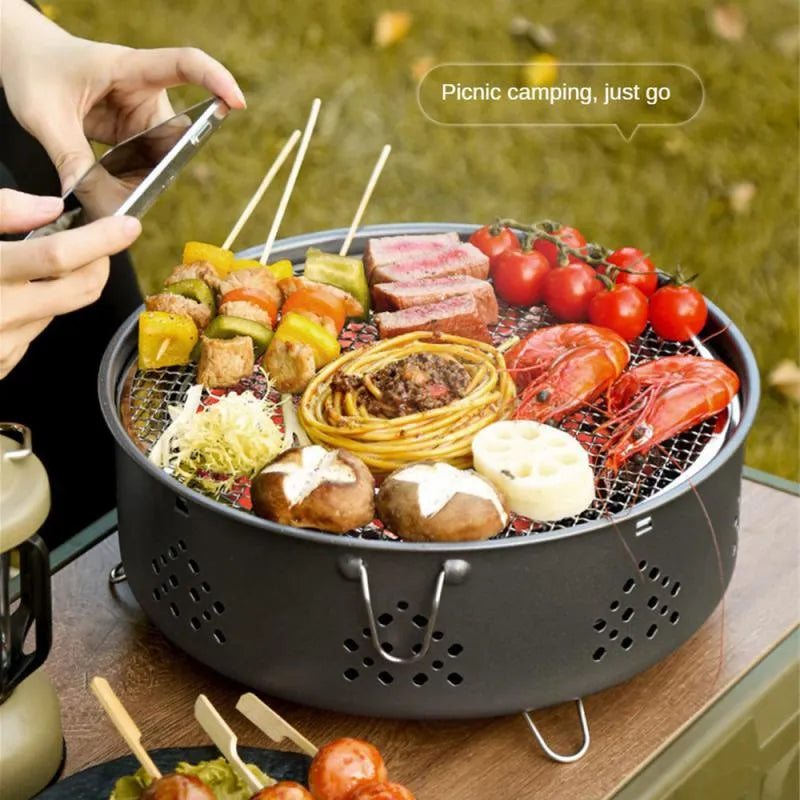 Portable stainless steel barbecue grill with detachable components and storage bag for outdoor cooking