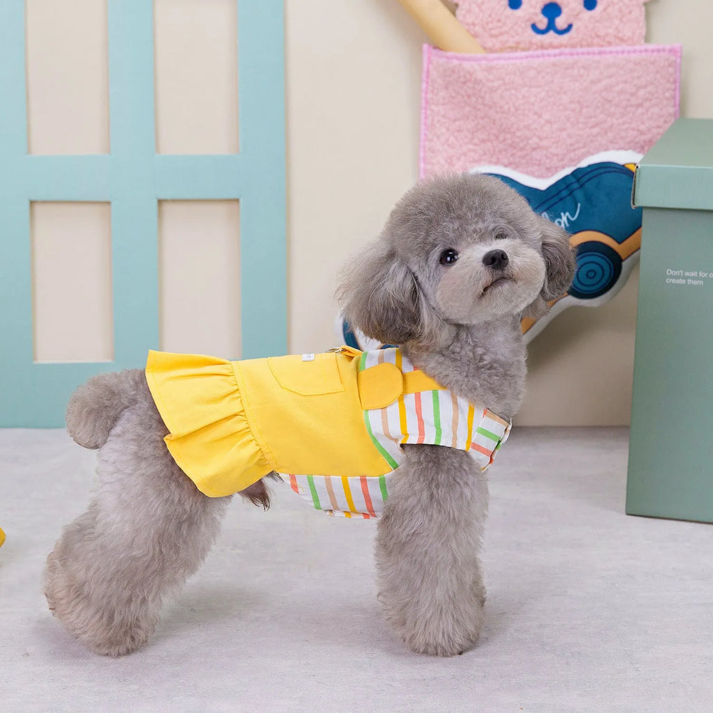 Orange and yellow patchwork striped cotton skirt for dogs on a mannequin