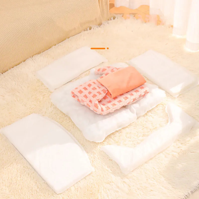 Green triangular hat-shaped sponge pet bed for cats, shown disassembled for washing.