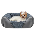 Beige stuffed kennel-style dog bed for a large golden retriever, showing plush nest design.