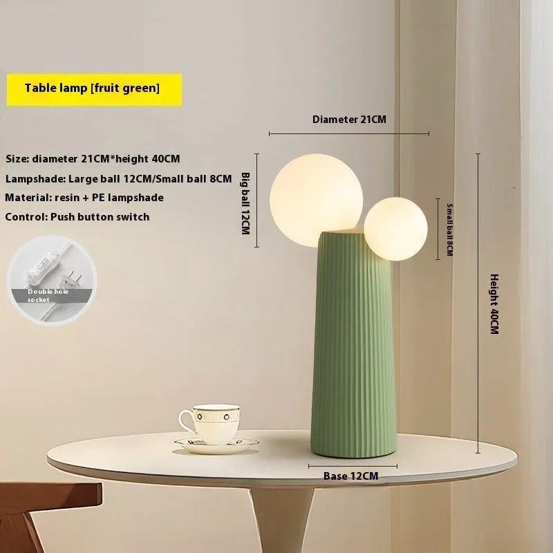 Modern minimalist cactus bedside lamp in milk coffee colour, resin and PE lampshade, 21cm diameter 40cm height, on bedside table