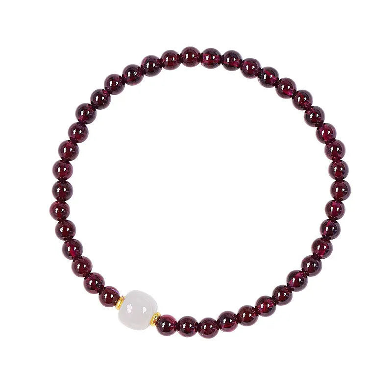 Women's U-shaped garnet bracelet in 18mm size with polished beads