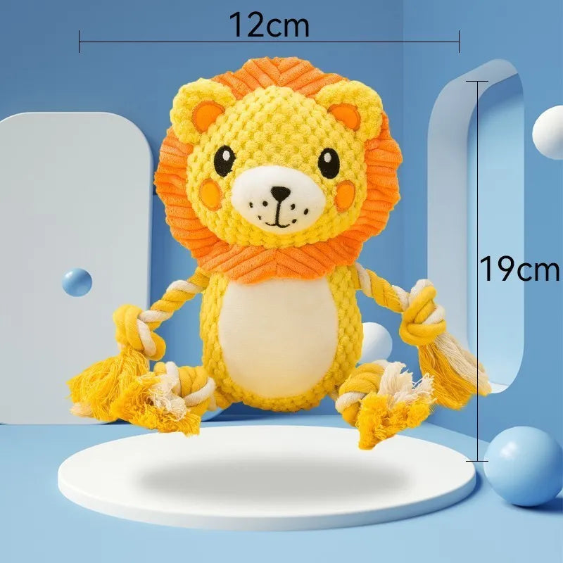 Two stuffed plush dog toys, a lion and a monkey, both featuring squeakers for interactive play.