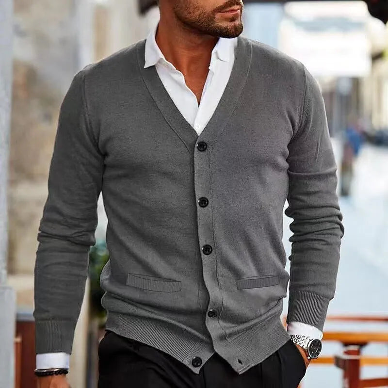 Men's slim fit acrylic cardigan sweater in wine red colour on a hanger.