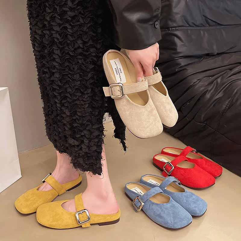 Women's flat half slipper in apricot colour with square toe and rubber sole.
