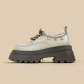White platform leather shoes with chunky heel and round toe in British style