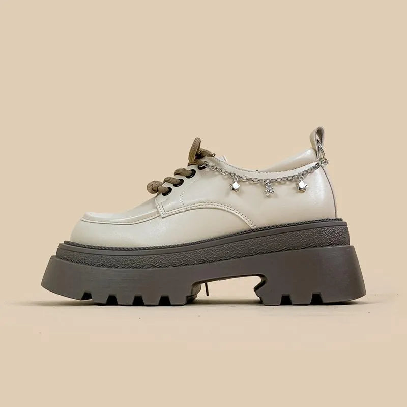 White platform leather shoes with chunky heel and round toe in British style
