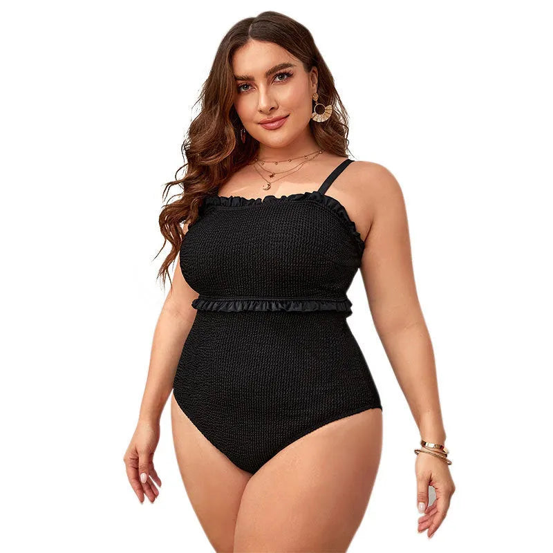 Black plus size one-piece swimsuit with double shoulder straps and a belly cover design.