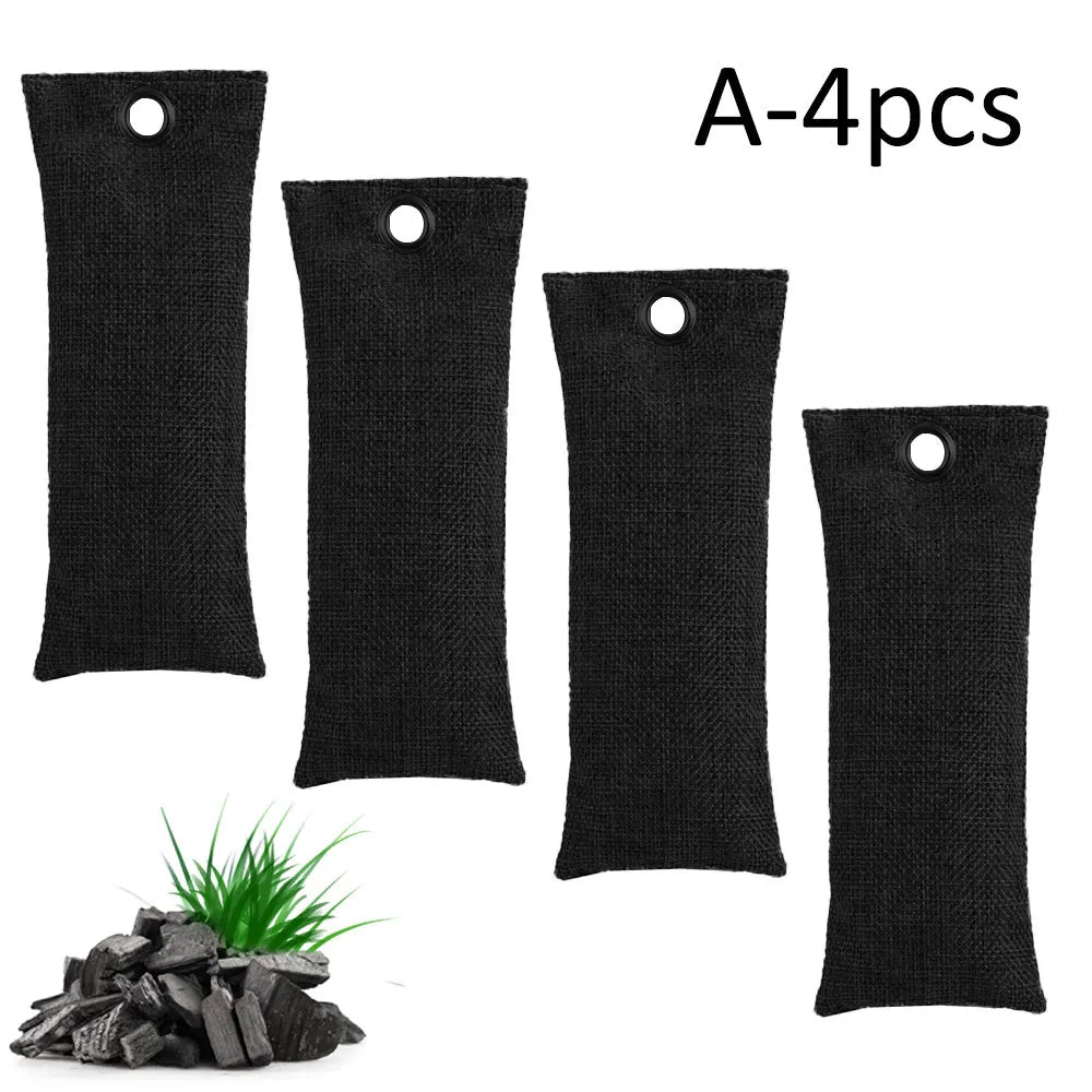 Black activated charcoal deodorising bag made of linen, measuring 16.5cm by 6.5cm.
