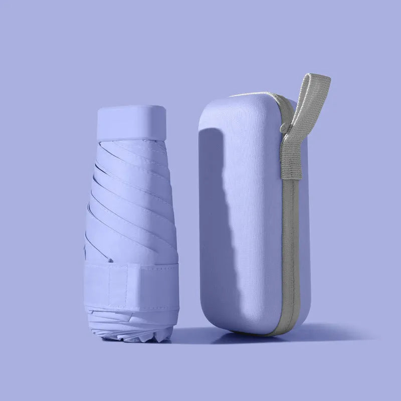 Ultra-light six-fold manual umbrella in sky blue with capsule box