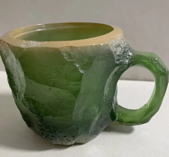 Purple resin mineral crystal coffee mug with handle showing 3D texture and 10cm height