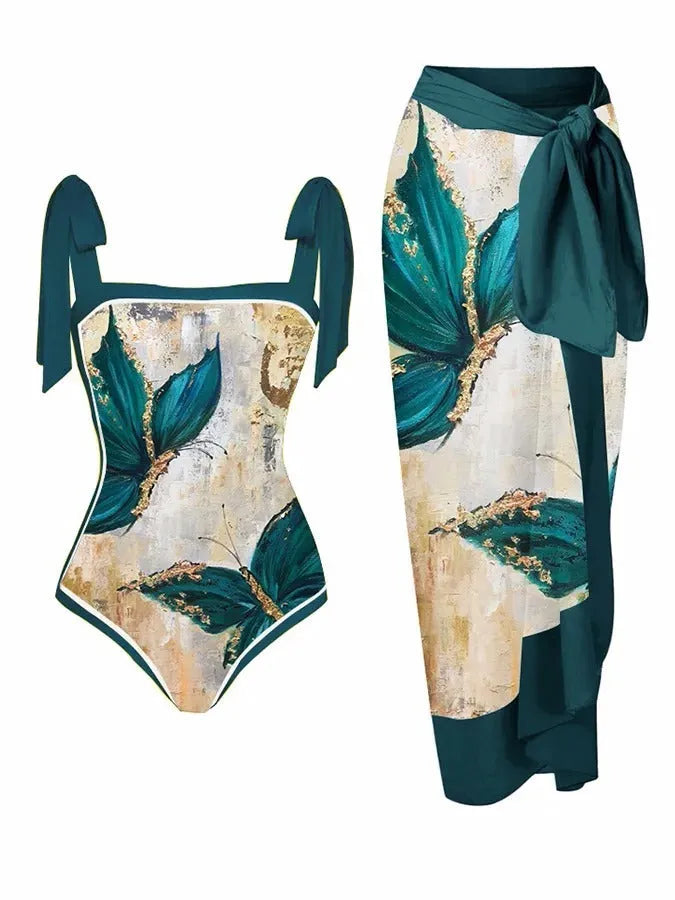 Women's printed two-piece chiffon swimsuit with a matching hip skirt in a floral design.