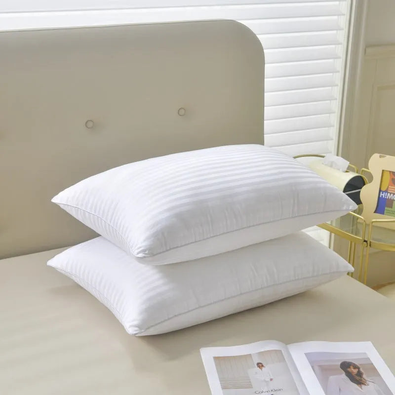 White cotton satin stripe pillow with feather and cotton filling in three loft weight options