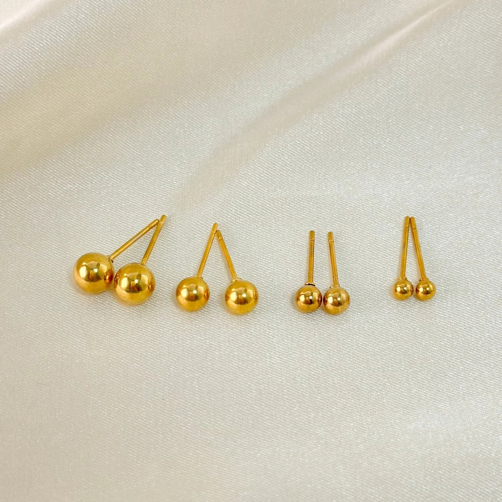 Stainless steel ball stud earrings in gold or silver plating, 3mm to 6mm sizes