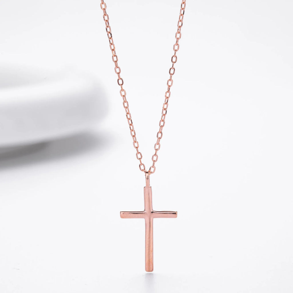 S925 sterling silver necklace with glossy cross pendant on an adjustable O-chain in gold, platinum, or rose gold finish.