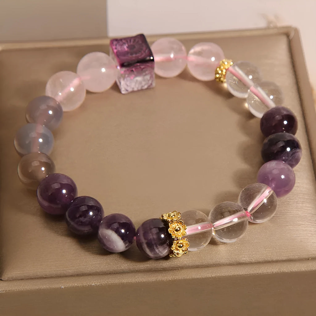 Purple women's amethyst crystal bracelet with rhinestone detailing measuring 10mm diameter
