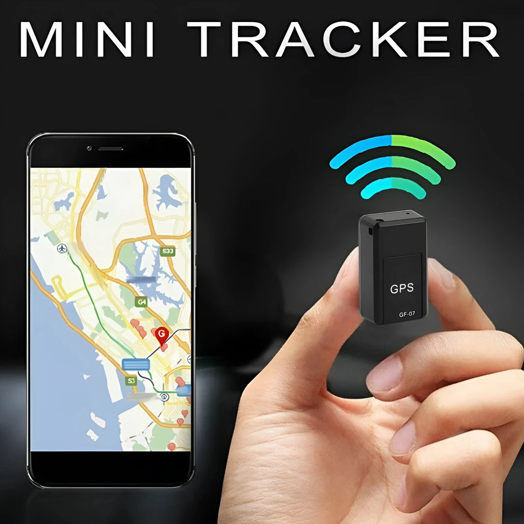 Small black plastic magnetic GPS car tracker device with USB cable.