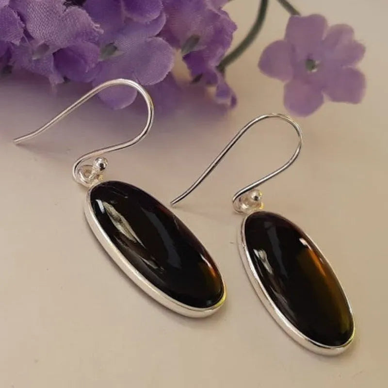 Women's fusion style earrings with oval black agate pendant in electroplated 925 silver geometric setting