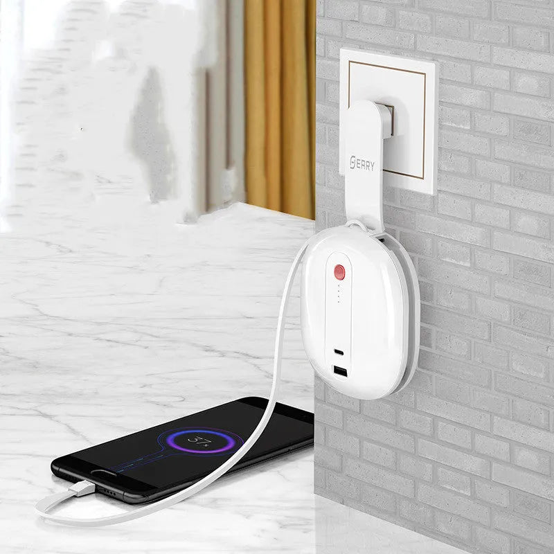 White and black power bank with built-in wall plug showing 10000mAh capacity and aluminium shell construction