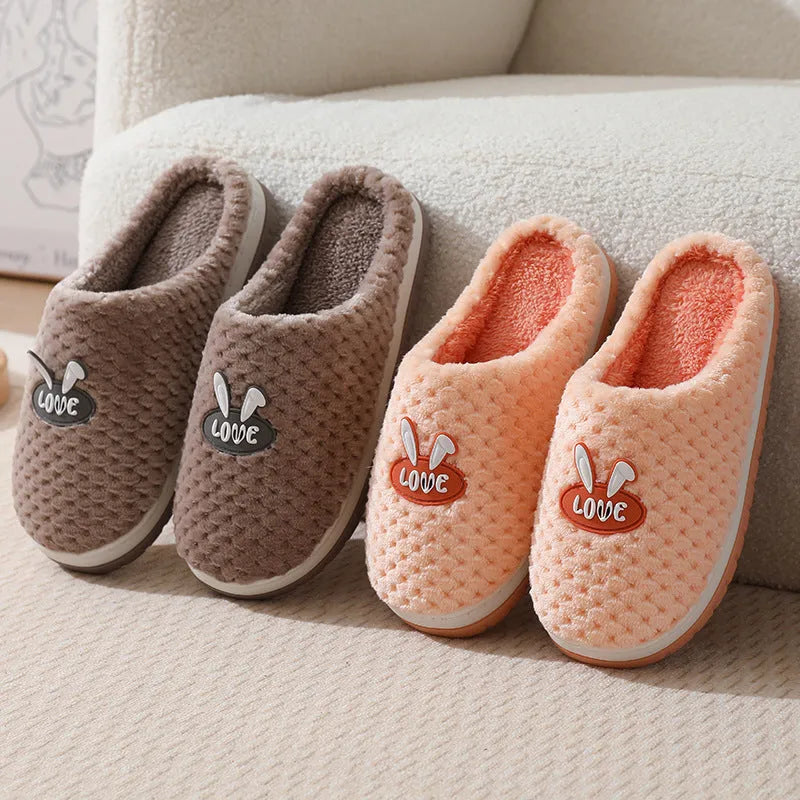 Women's plaid design artificial fur house slippers with a thick rubber non-slip sole in apricot colour