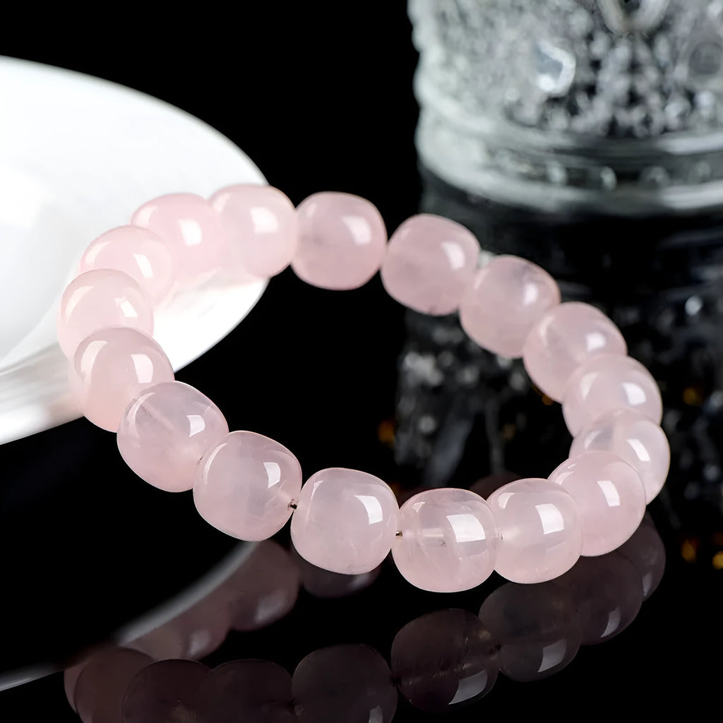Natural bamboo style crystal barrel bead bracelet in pink with 11-12mm geometric beads
