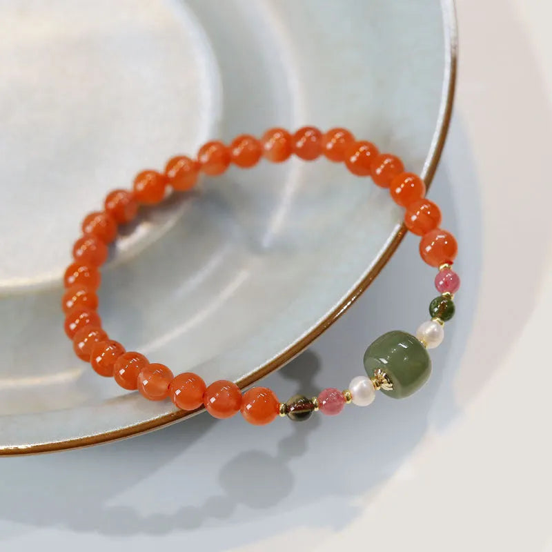 Women's retro ethnic bracelet made from round South Red Agate beads.