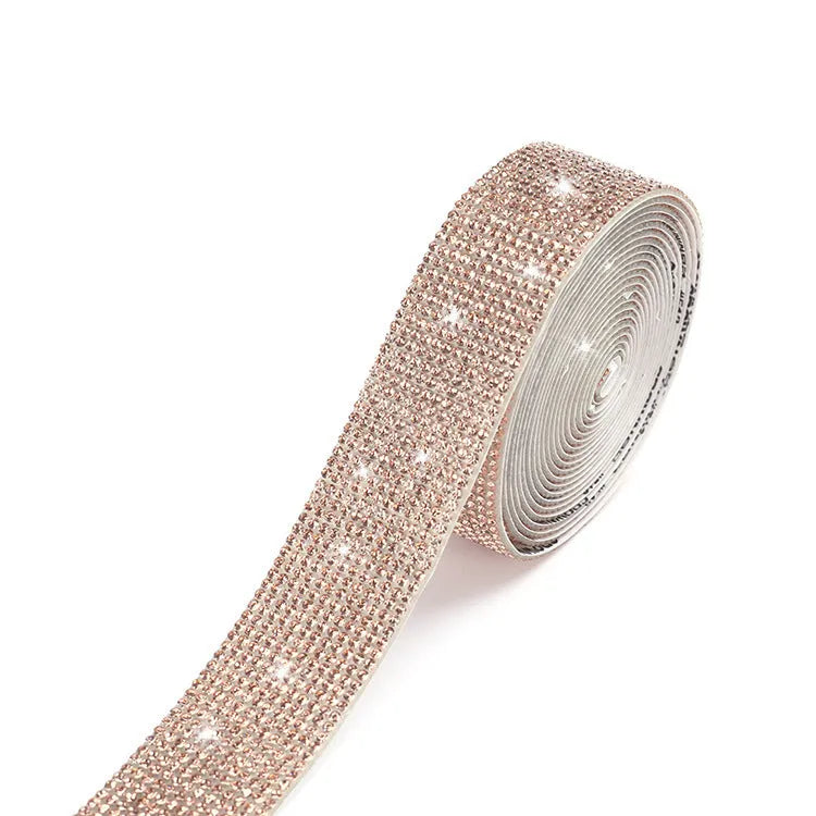 Self-adhesive strip with rows of sparkling electroplated glass rhinestones in white and iridescent colours