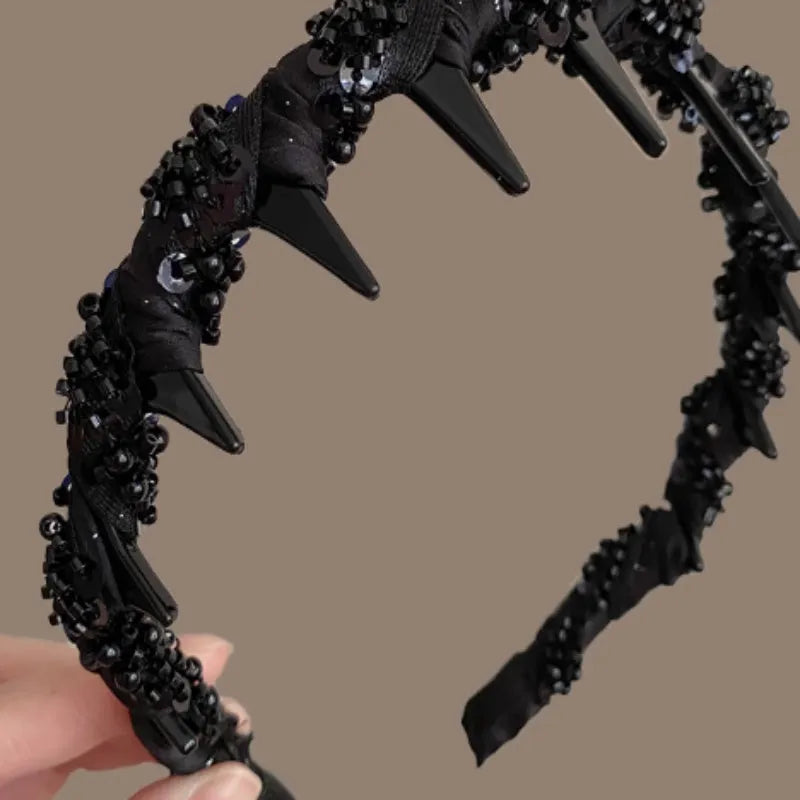 French velvet hair band with crystal wave design and non-slip grip.