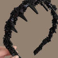 French velvet hair band with crystal wave design and non-slip grip.