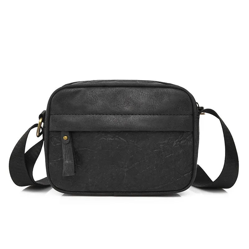Men's retro style paper crossbody bag in black, brown, and silver colour options.