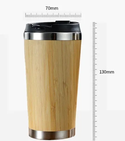 Bamboo and stainless steel insulated coffee cup with lid and foam pad, 420ml capacity.