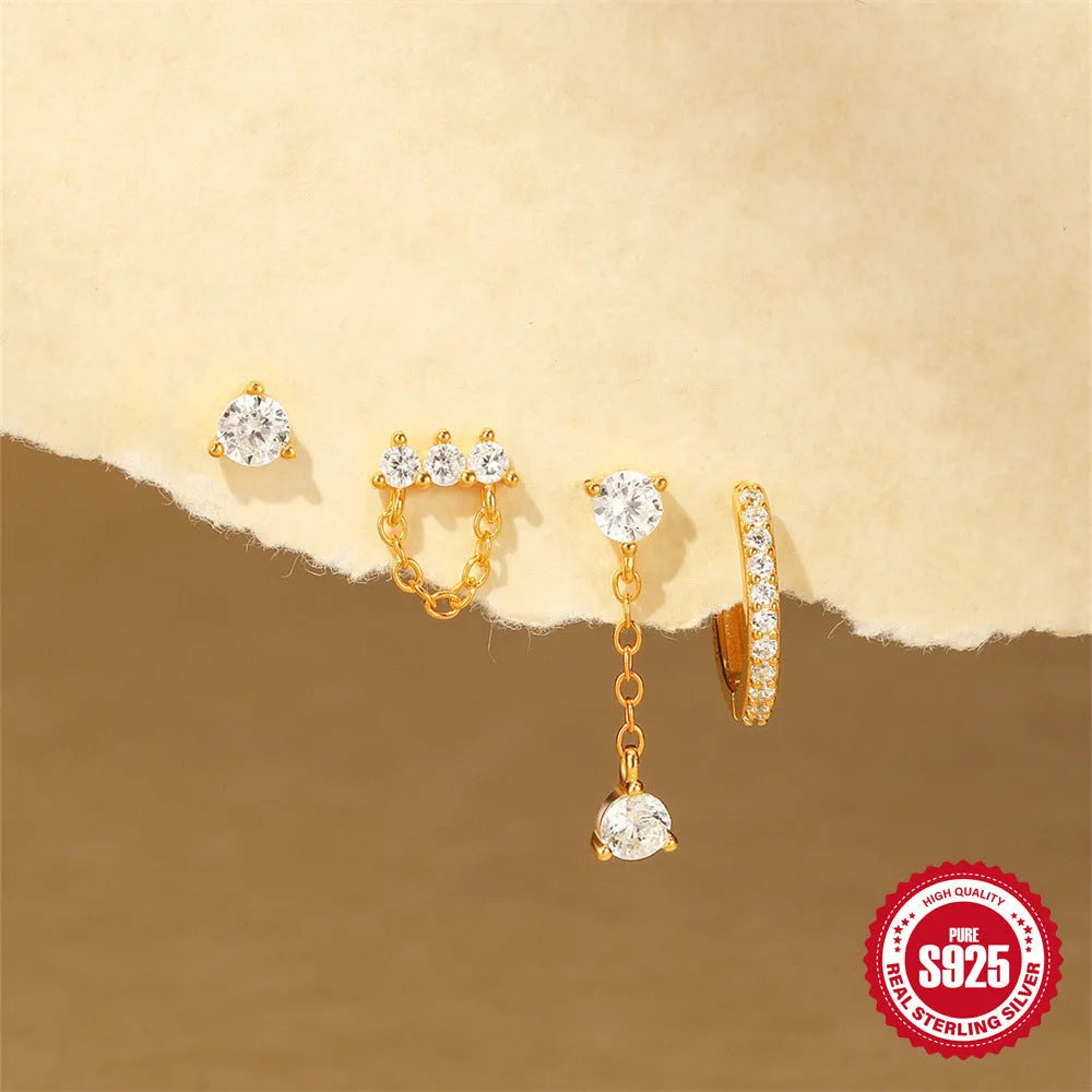 Geometric clover petal earrings in sterling silver with electroplated gold finish.