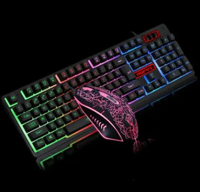 Wired USB keyboard and mouse set with backlit keyboard and optical mouse on a desk.