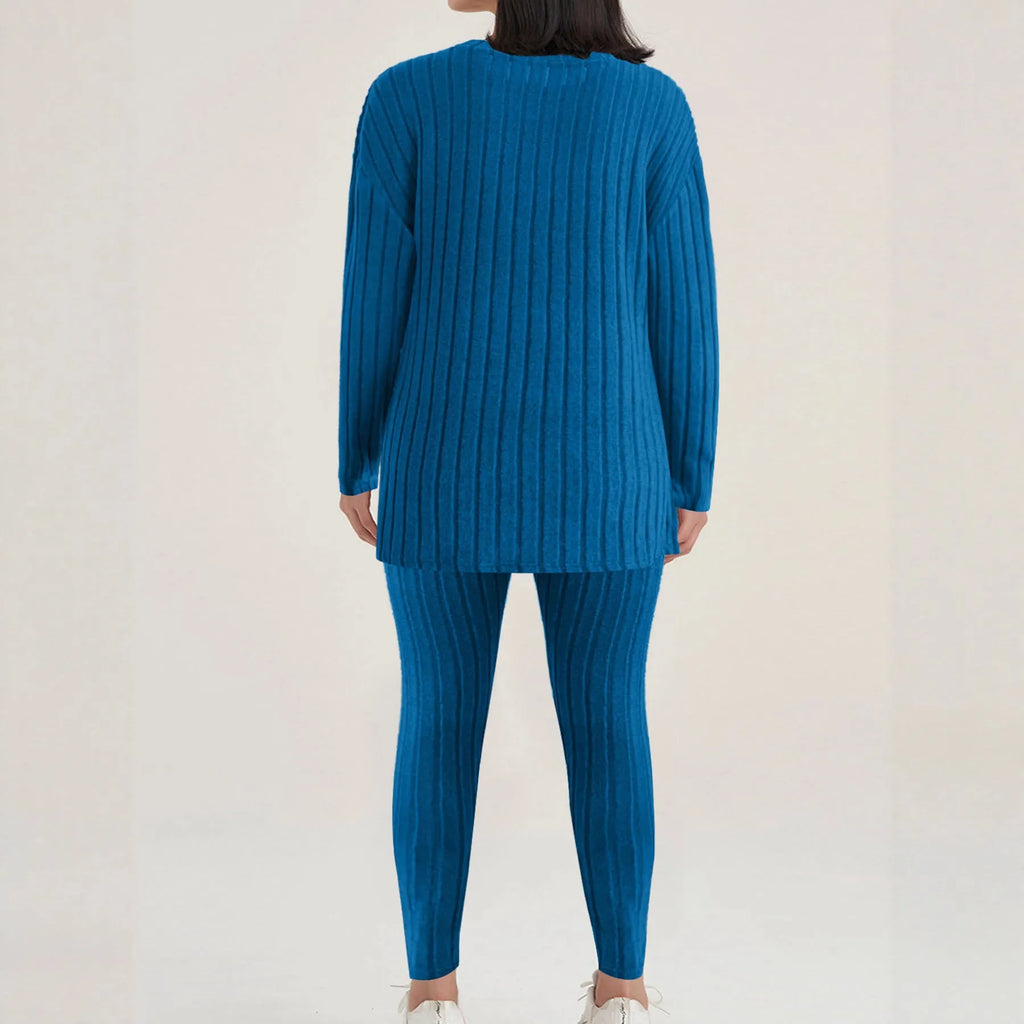 Women's black sunken stripe casual two-piece homewear set with short sleeve top and trousers.