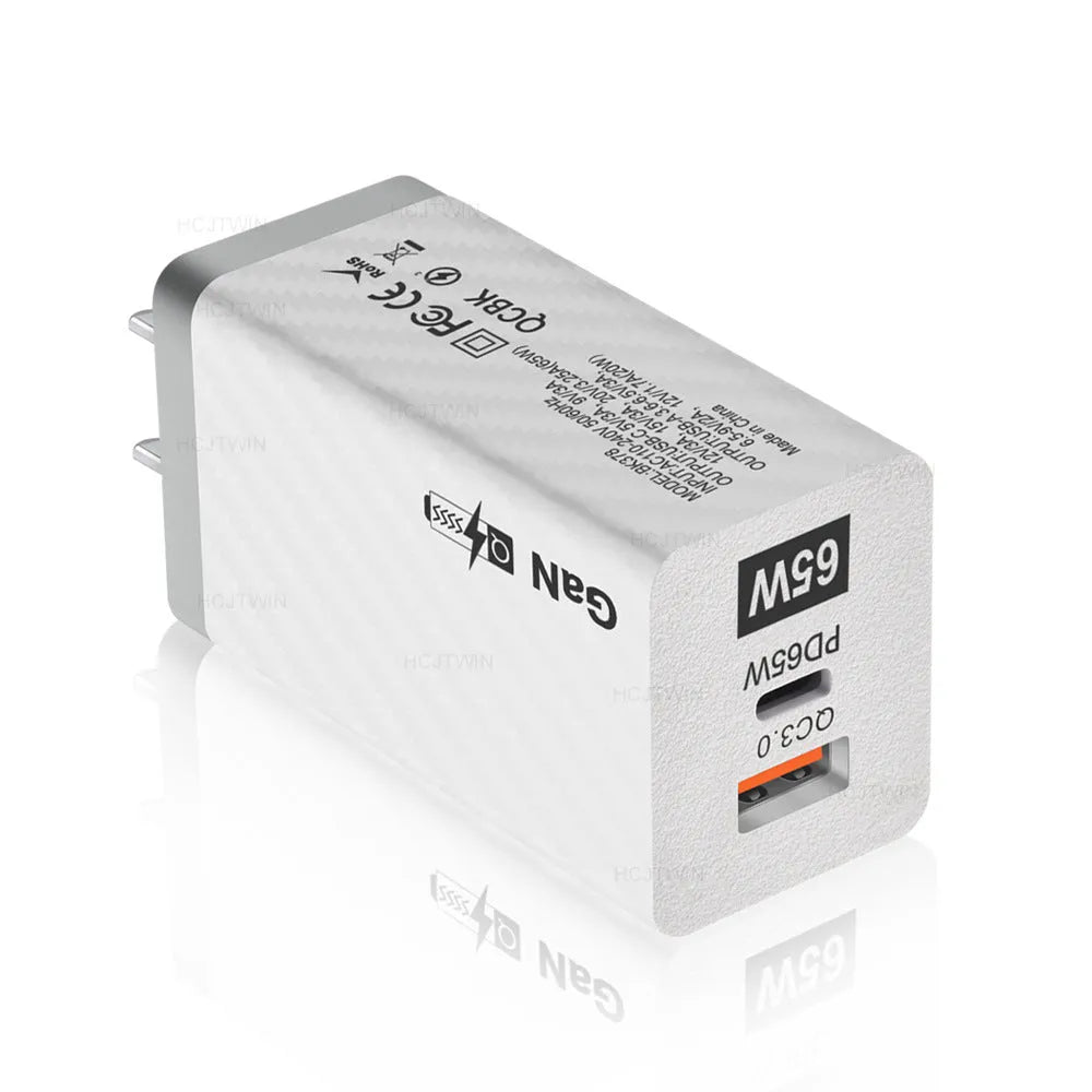 White Gallium Nitride 65W USB-C laptop charger with compact design measuring 38mm wide