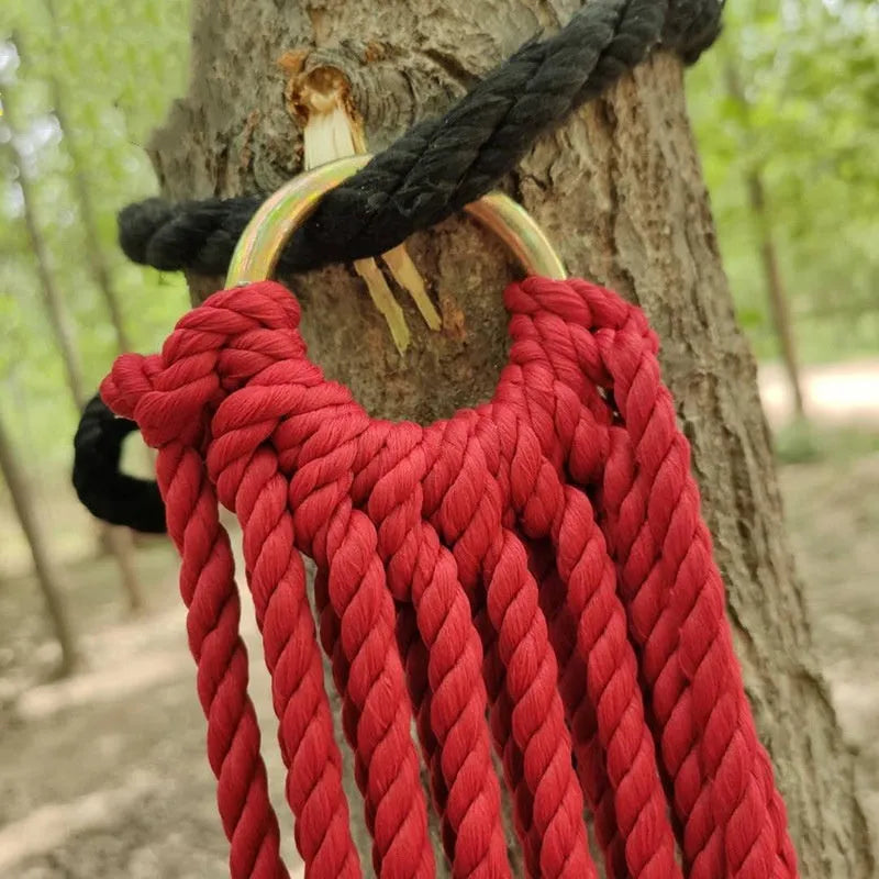 Nylon rope mesh hammock with tying system shown outdoors