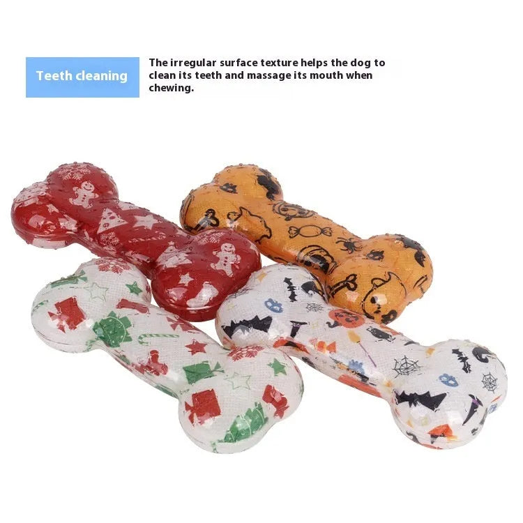 Orange Halloween pumpkin colour TPR bone dog toy with printed details and crinkle squeak sound
