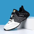 Casual sneakers for teenagers with thick plastic soles and mesh lining in black and grey colour option