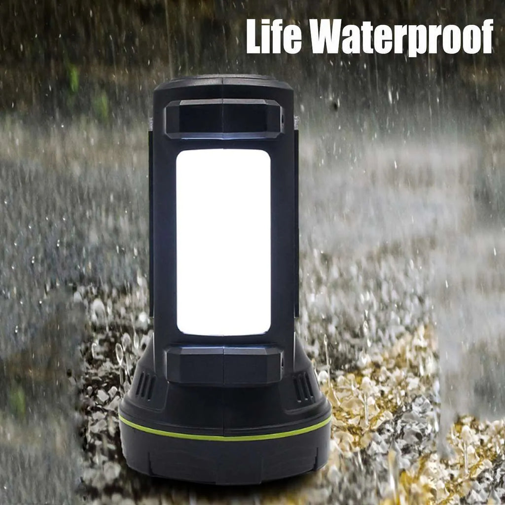 Green USB rechargeable super bright LED flashlight with long-range beam on a table.